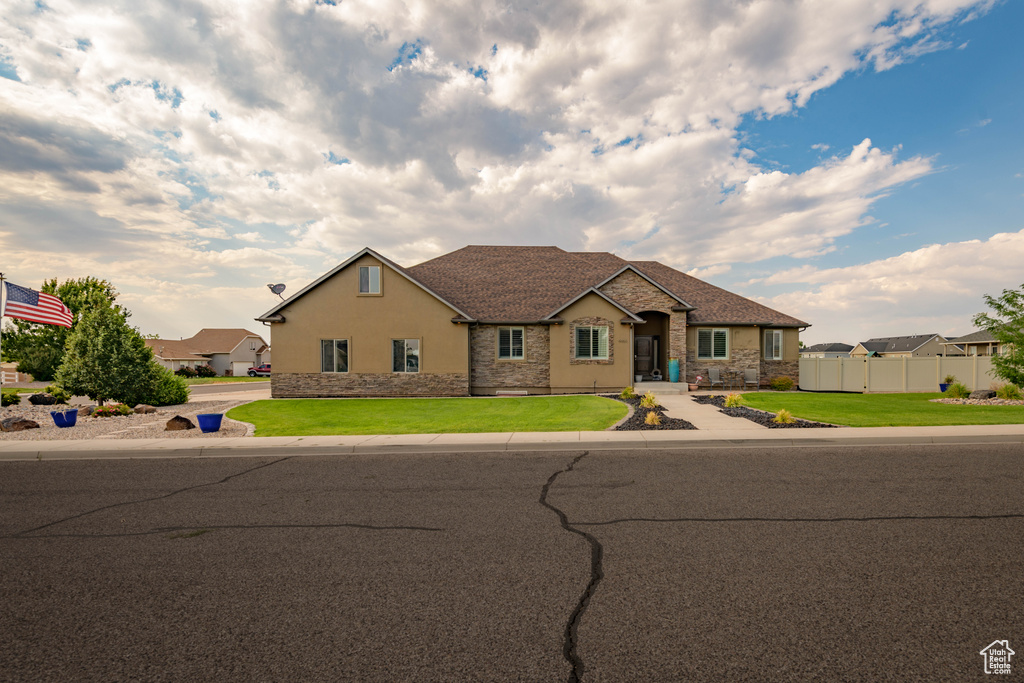 View of front of home with a front yard