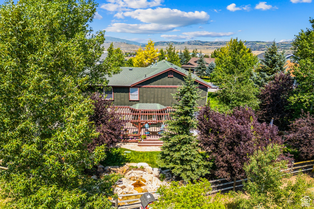 Exterior space featuring a mountain view