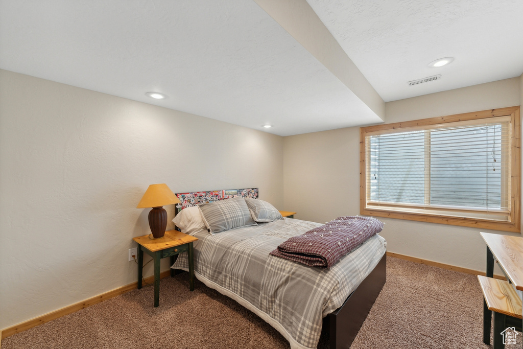 View of carpeted bedroom