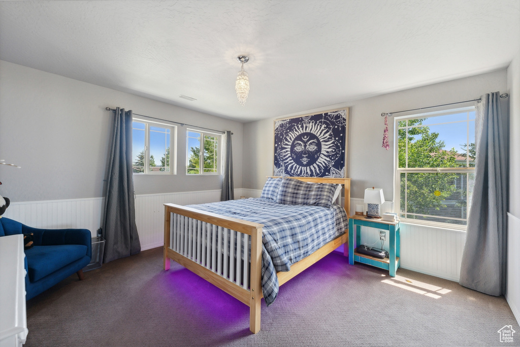 Bedroom with carpet flooring