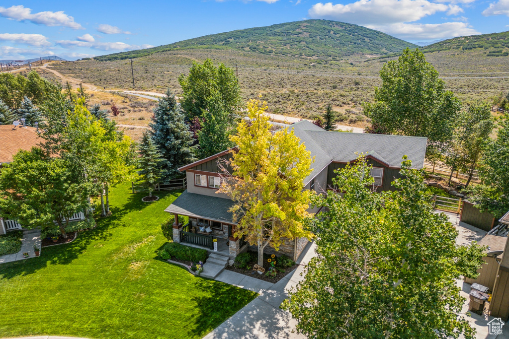 Birds eye view of property featuring a mountain view