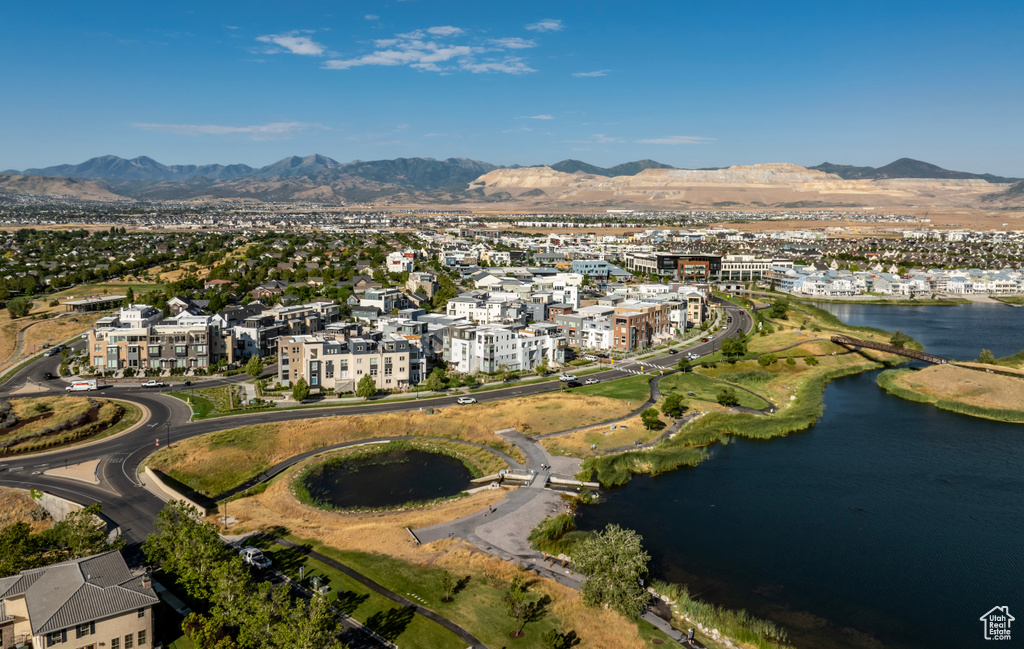 Aerial view featuring a water and mountain view