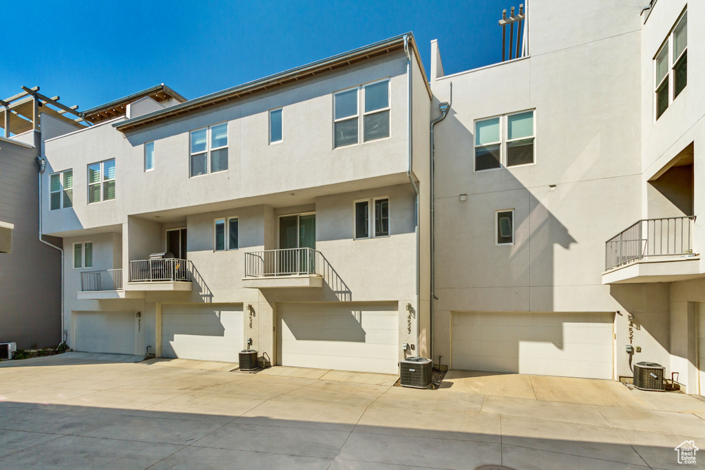 Exterior space featuring a garage and central AC