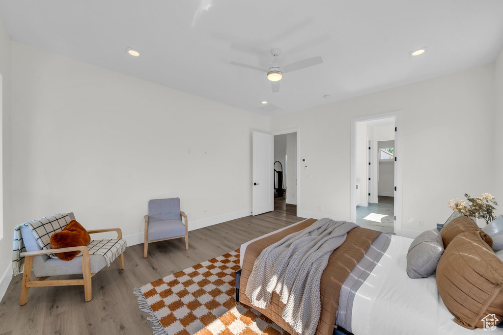 Bedroom featuring light hardwood / wood-style flooring and ceiling fan