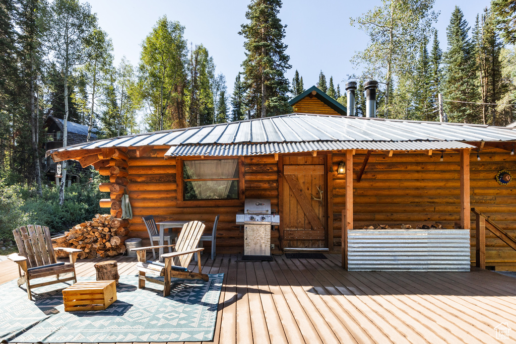 Wooden deck with a grill