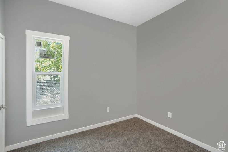 View of carpeted spare room