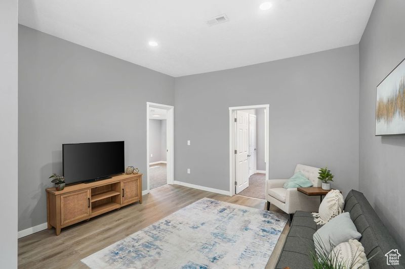 Living room featuring light hardwood / wood-style flooring