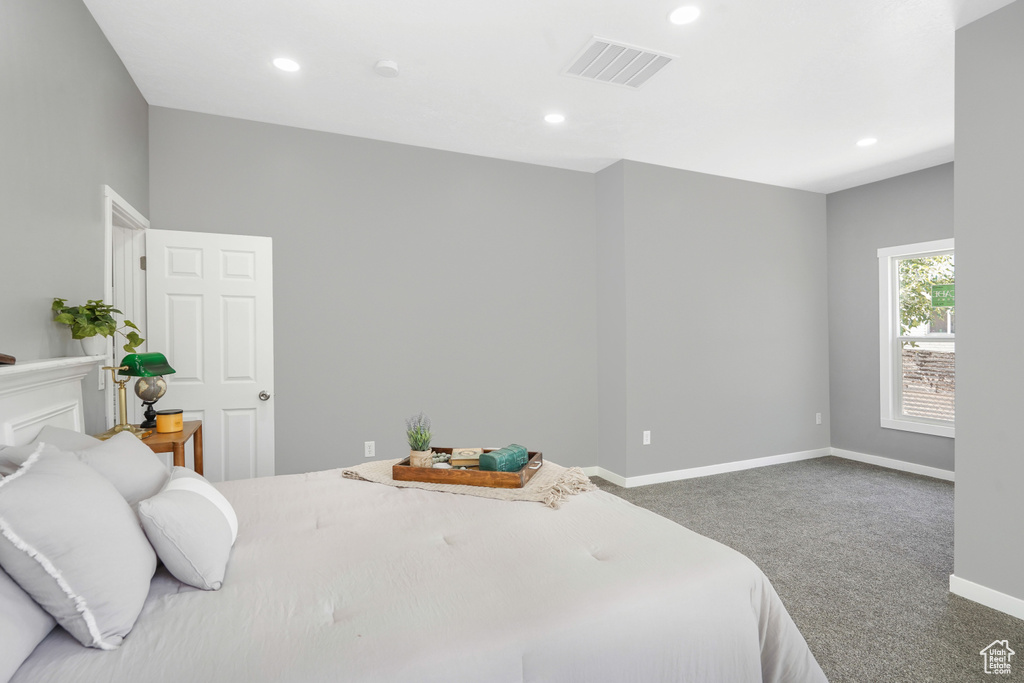 Bedroom featuring carpet floors