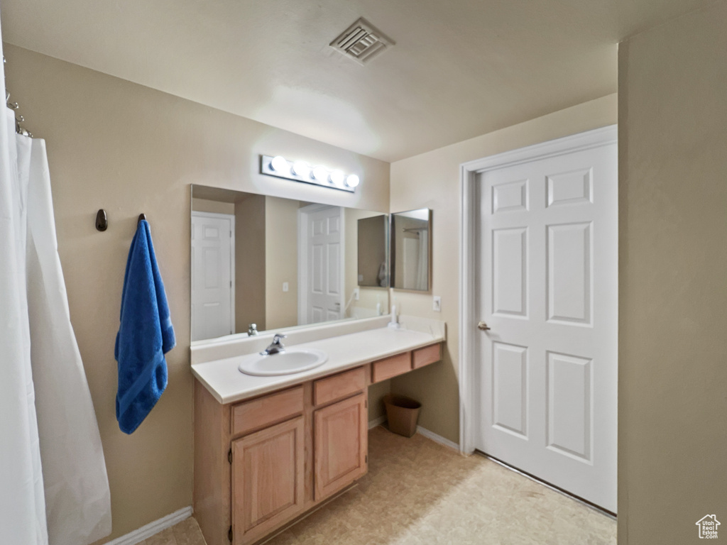 Bathroom featuring vanity