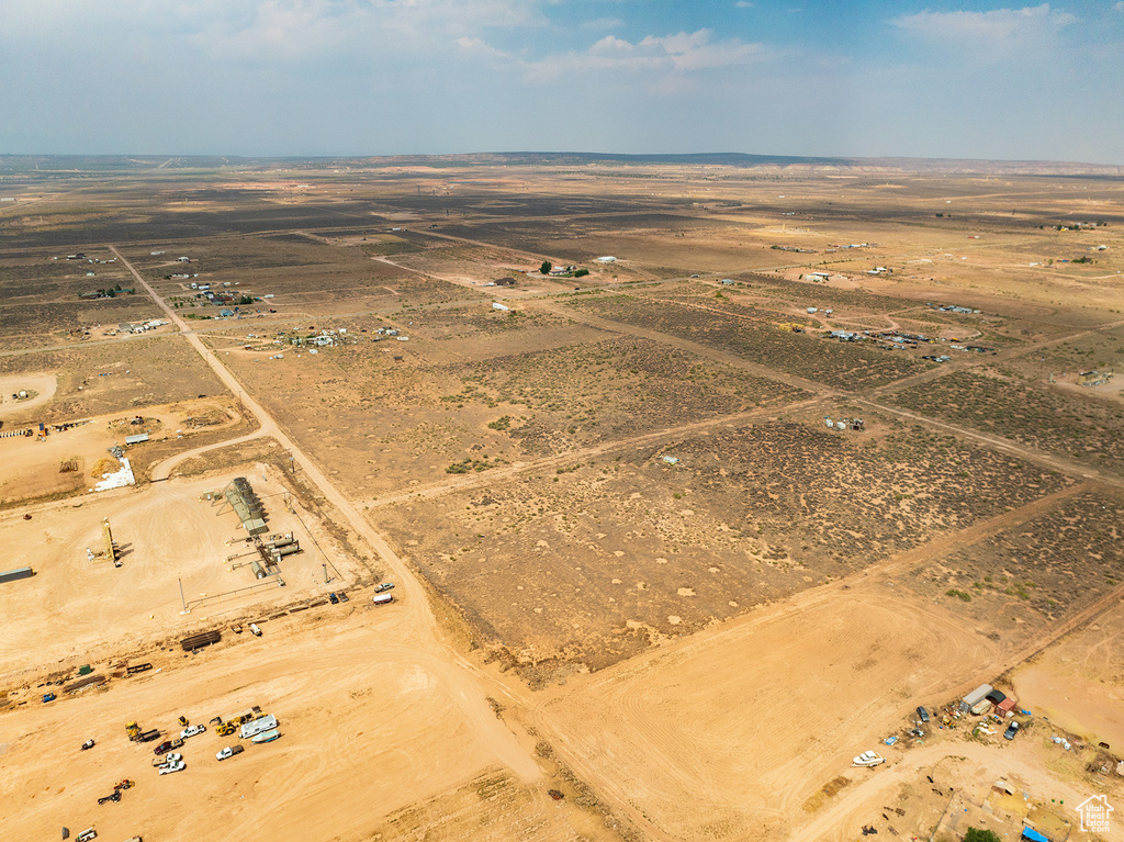 Birds eye view of property featuring a rural view