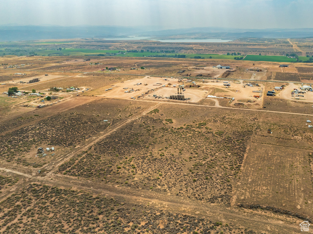 Birds eye view of property with a rural view