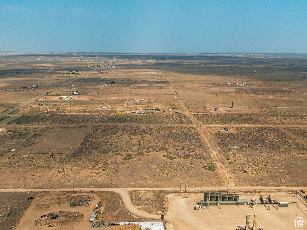 Birds eye view of property featuring a rural view