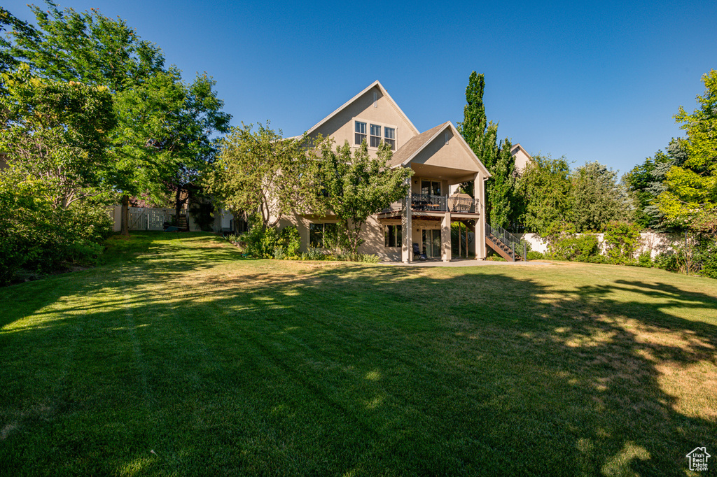 View of yard with a deck