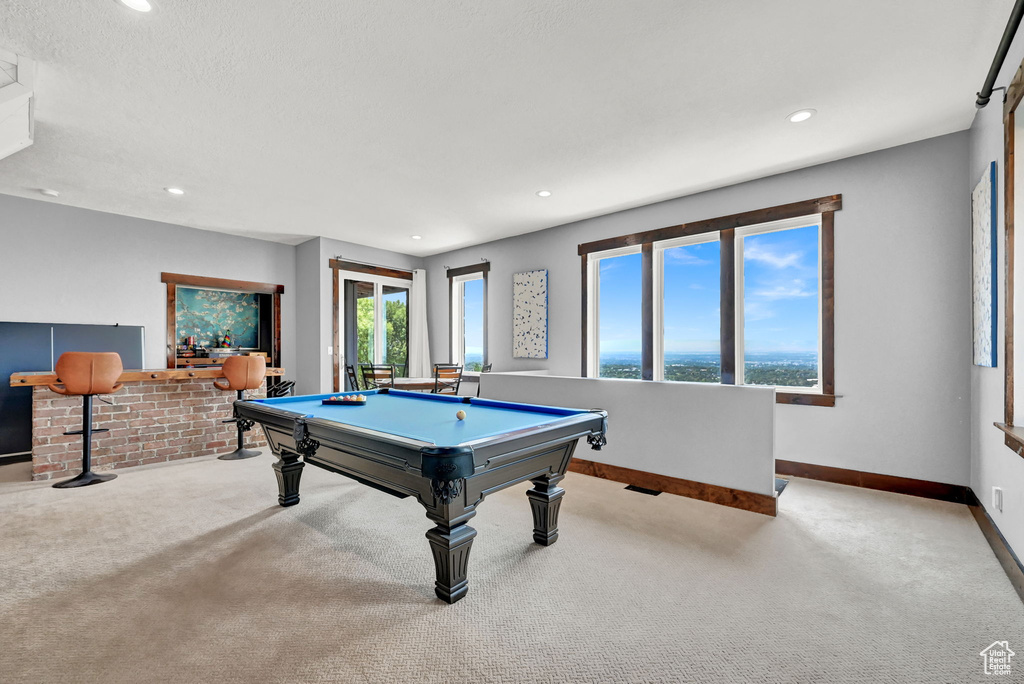 Recreation room featuring light colored carpet and pool table