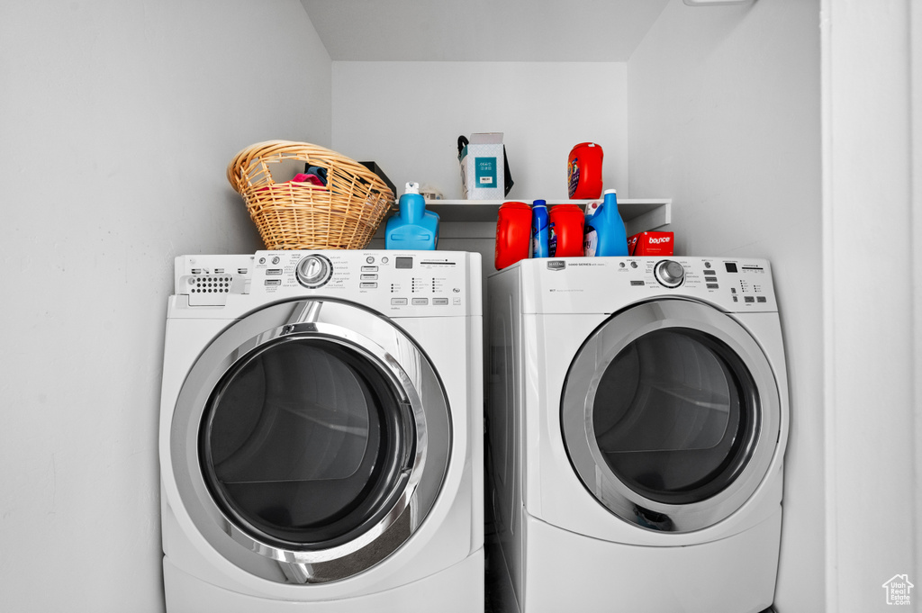 Laundry area featuring independent washer and dryer