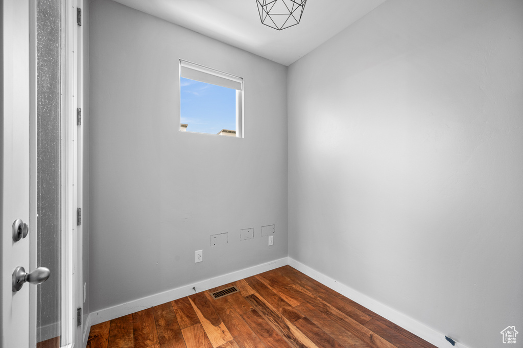 Unfurnished room with wood-type flooring