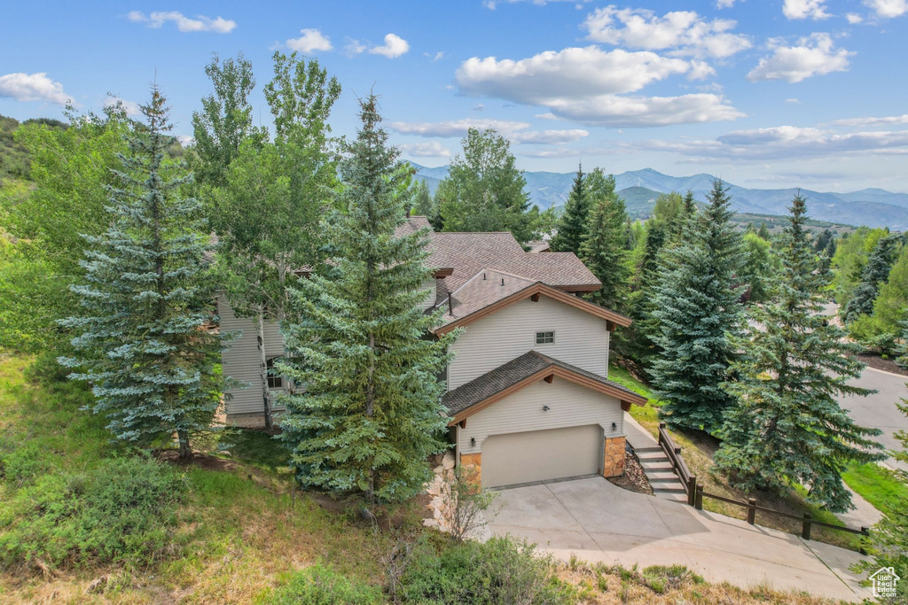 Exterior space featuring a mountain view