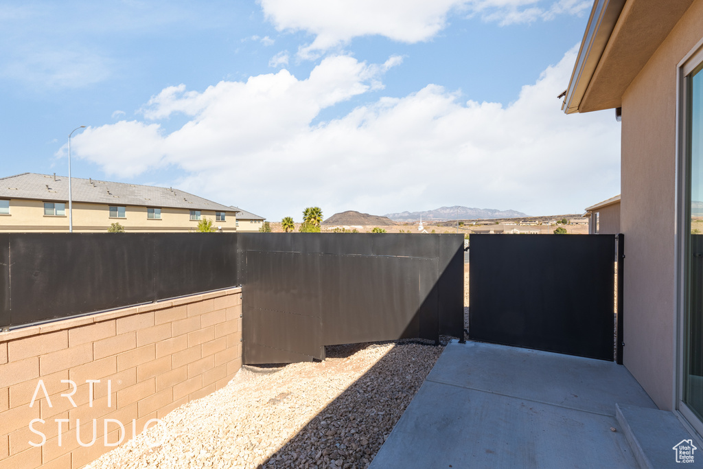 View of patio featuring a mountain view