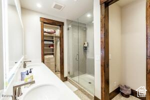 Bathroom with shower with separate bathtub