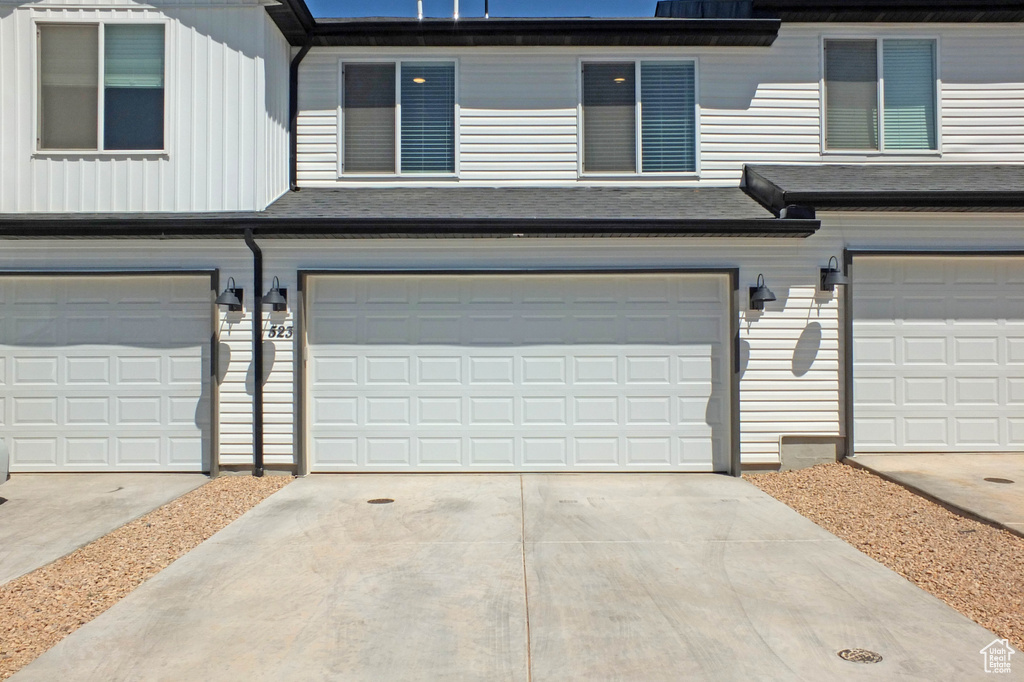 View of front of property with a garage