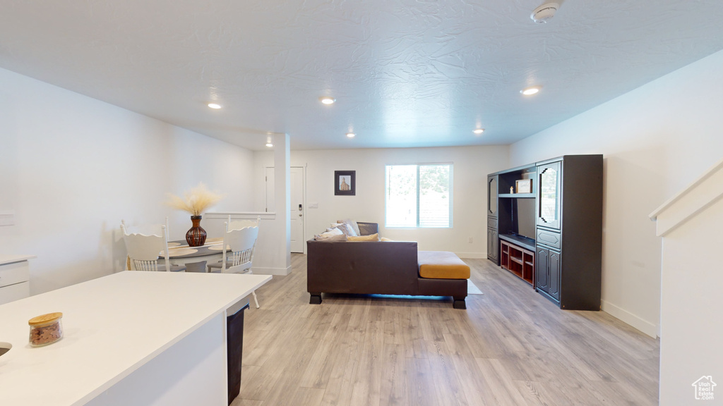 Kitchen with light wood-type flooring