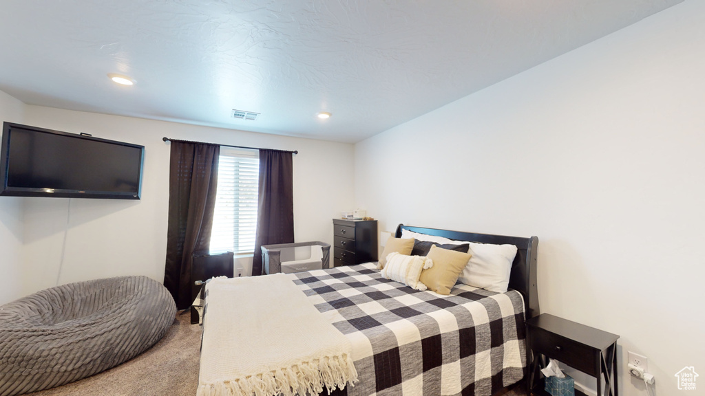 View of carpeted bedroom