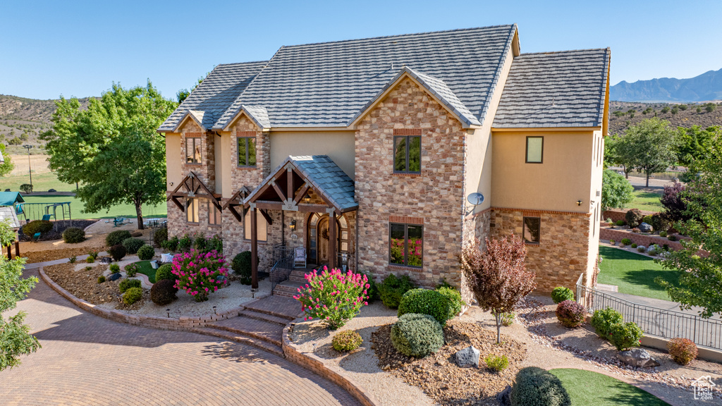 View of front of house featuring a mountain view