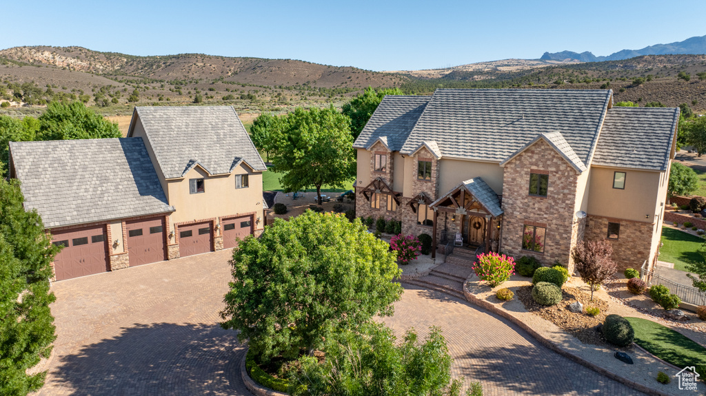 Exterior space featuring a mountain view and a garage