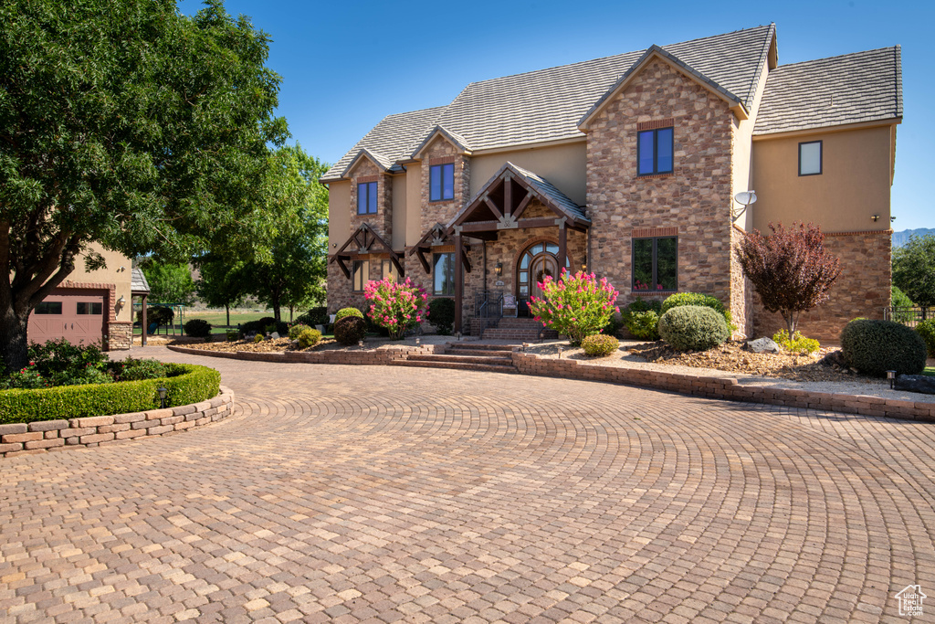 View of front of house with a garage