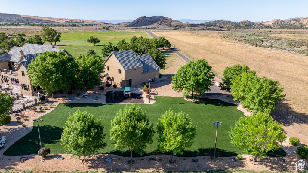 Drone / aerial view with a mountain view and a rural view