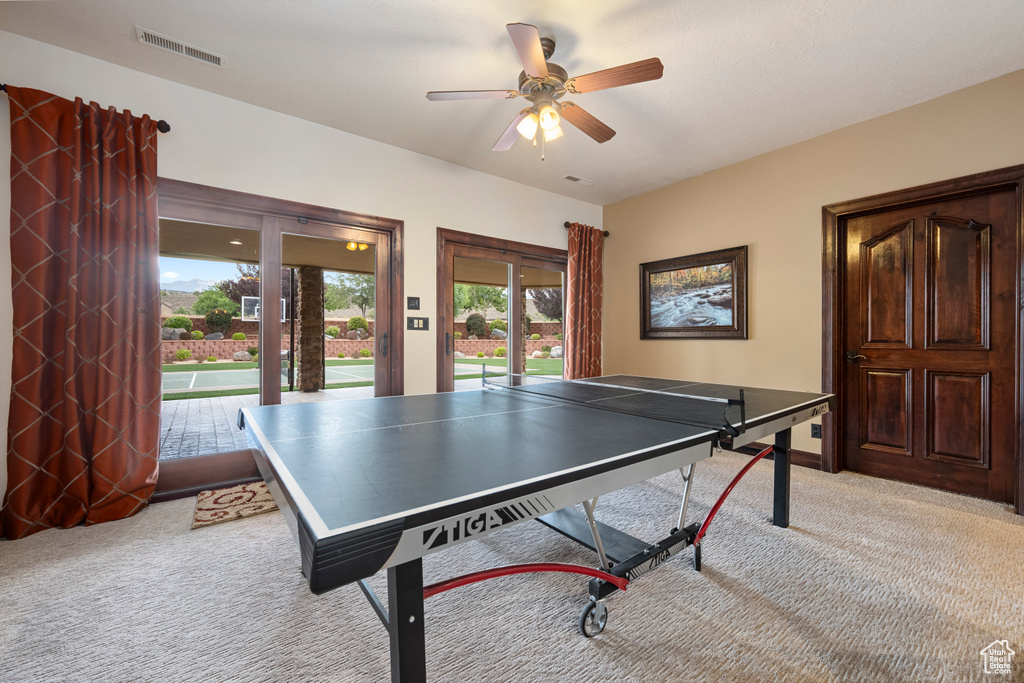 Game room featuring carpet floors, french doors, and ceiling fan