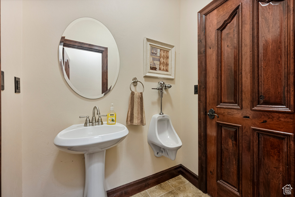 Bathroom featuring tile patterned flooring