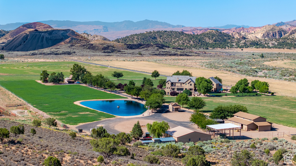 View of swimming pool with a mountain view