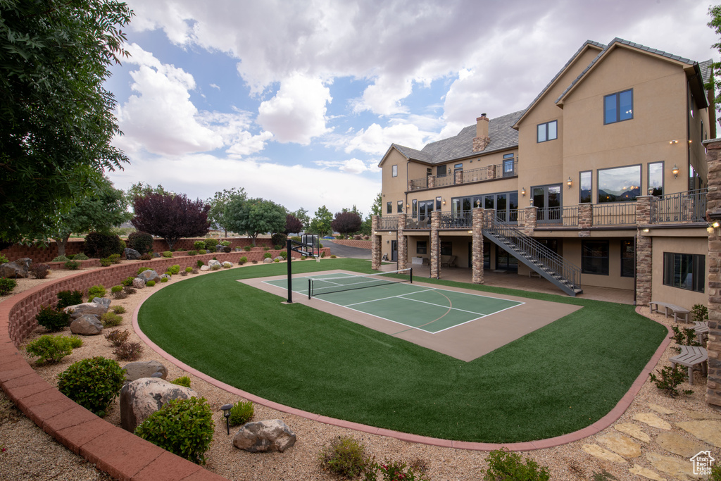 View of community featuring a lawn