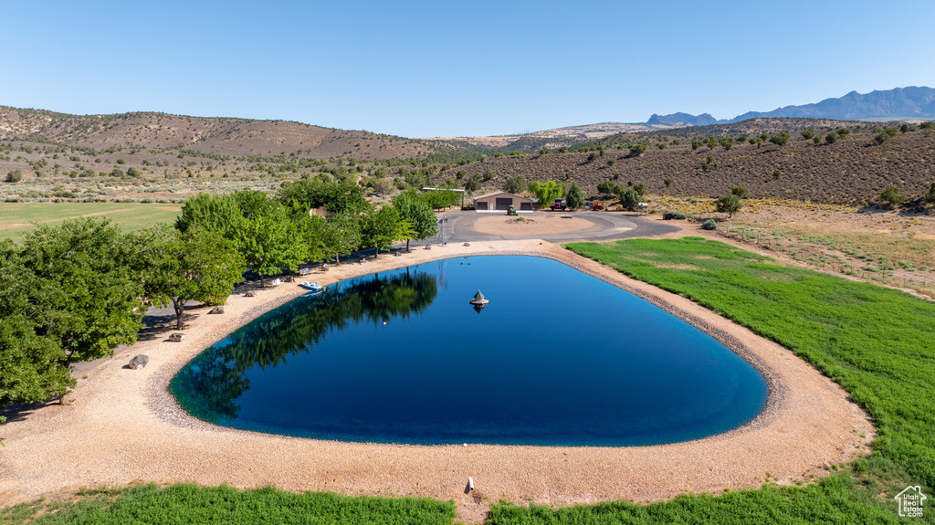 View of pool with a mountain view