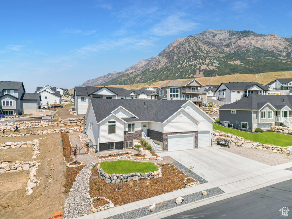 View of front of house with a mountain view