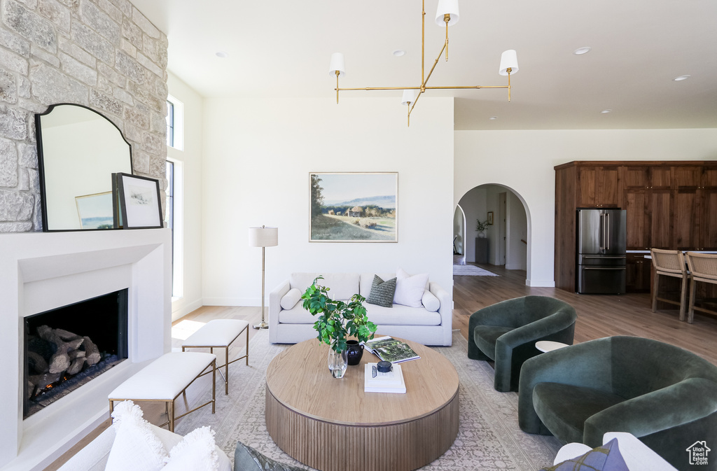 Living room with light hardwood / wood-style flooring