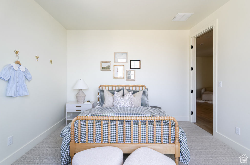 Bedroom featuring wood-type flooring