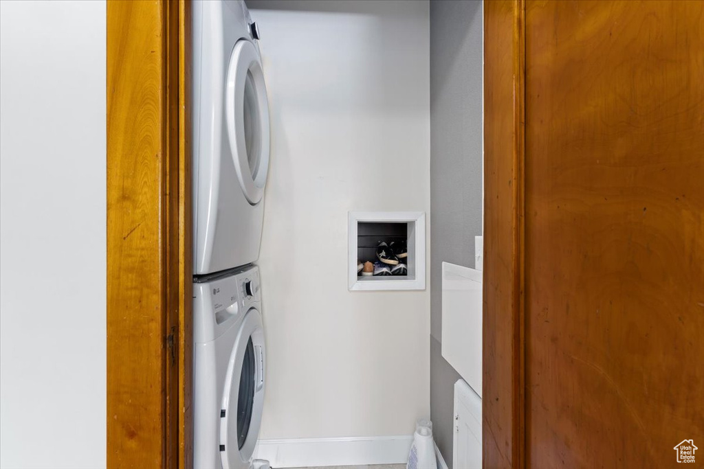 Laundry area with stacked washer / dryer