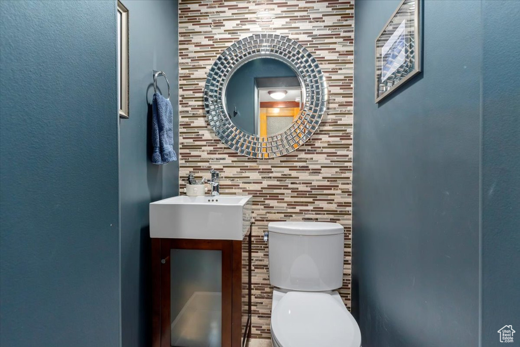 Bathroom with toilet and vanity