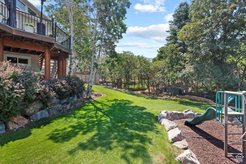 View of yard with a playground