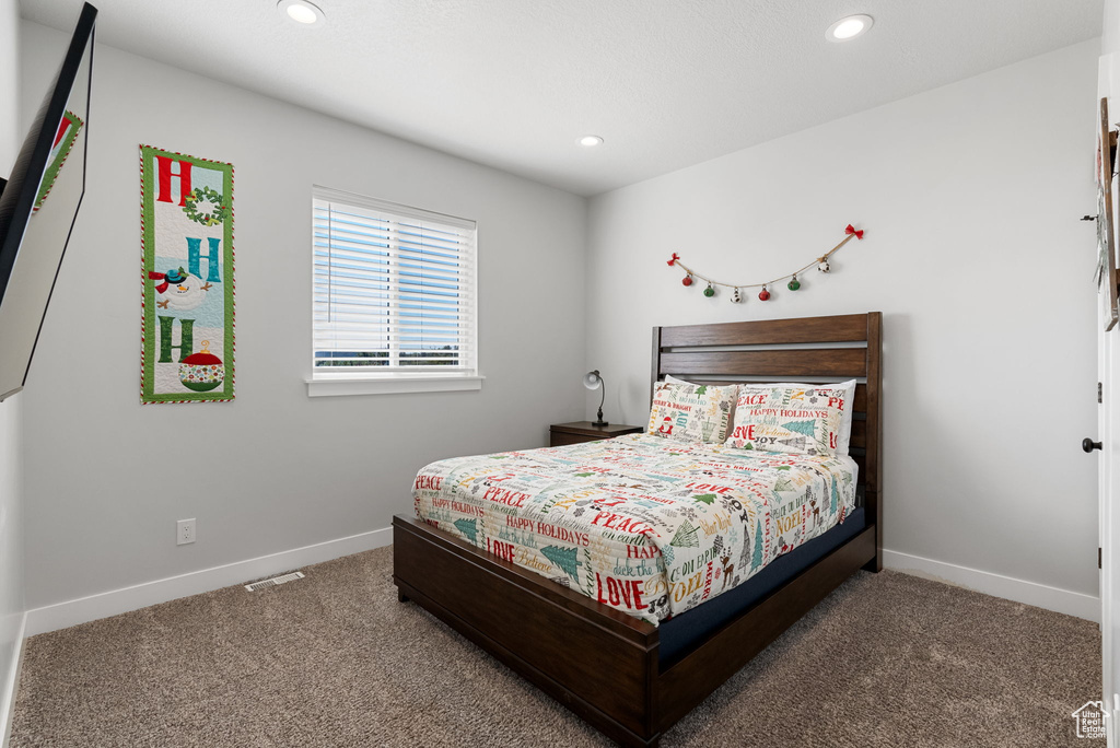 View of carpeted bedroom