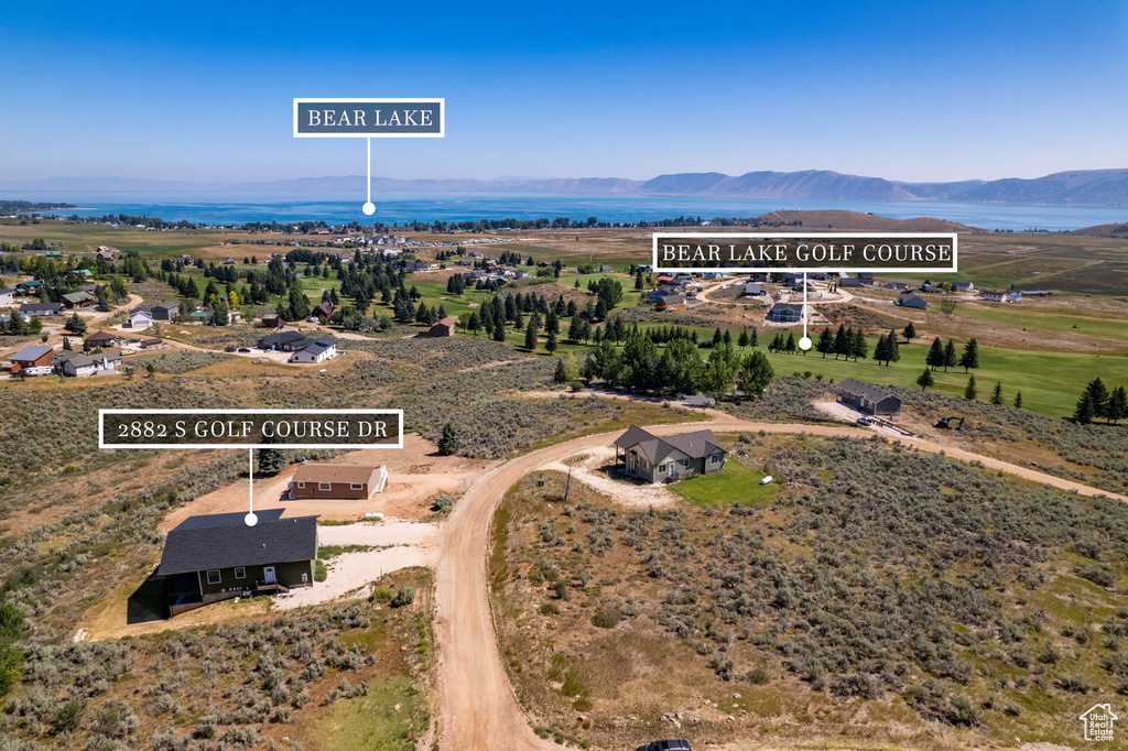 Birds eye view of property with a mountain view