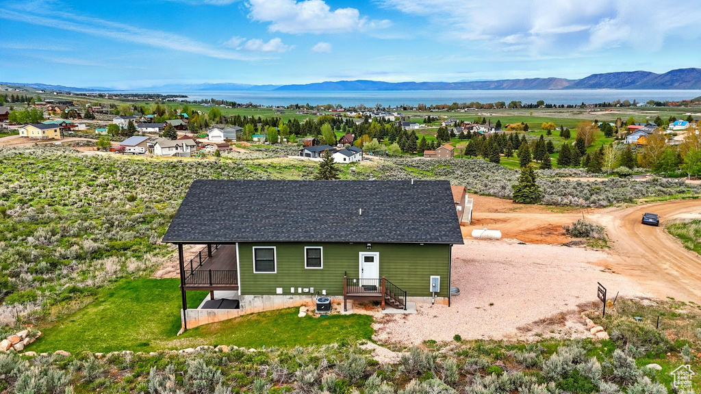 View of subject property featuring a mountain backdrop