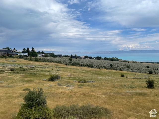 View of landscape with a water view