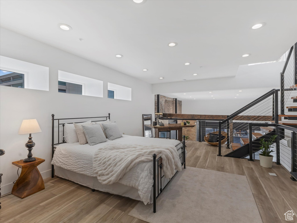 Bedroom with light wood-type flooring