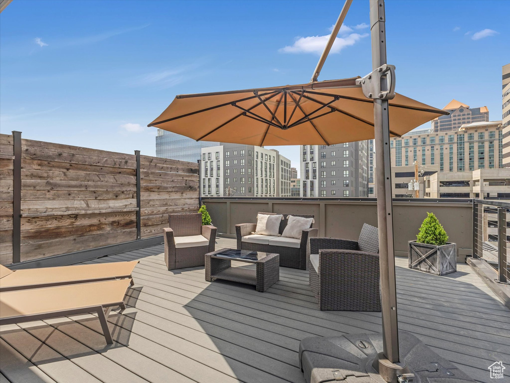 Wooden deck with an outdoor hangout area