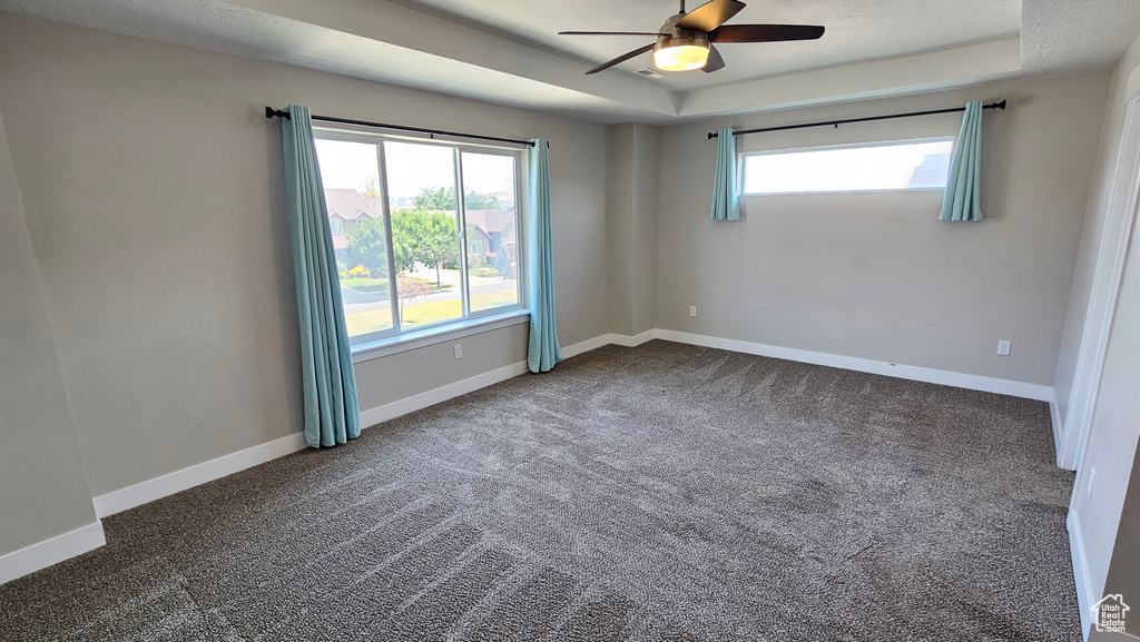 Unfurnished room with carpet flooring and ceiling fan