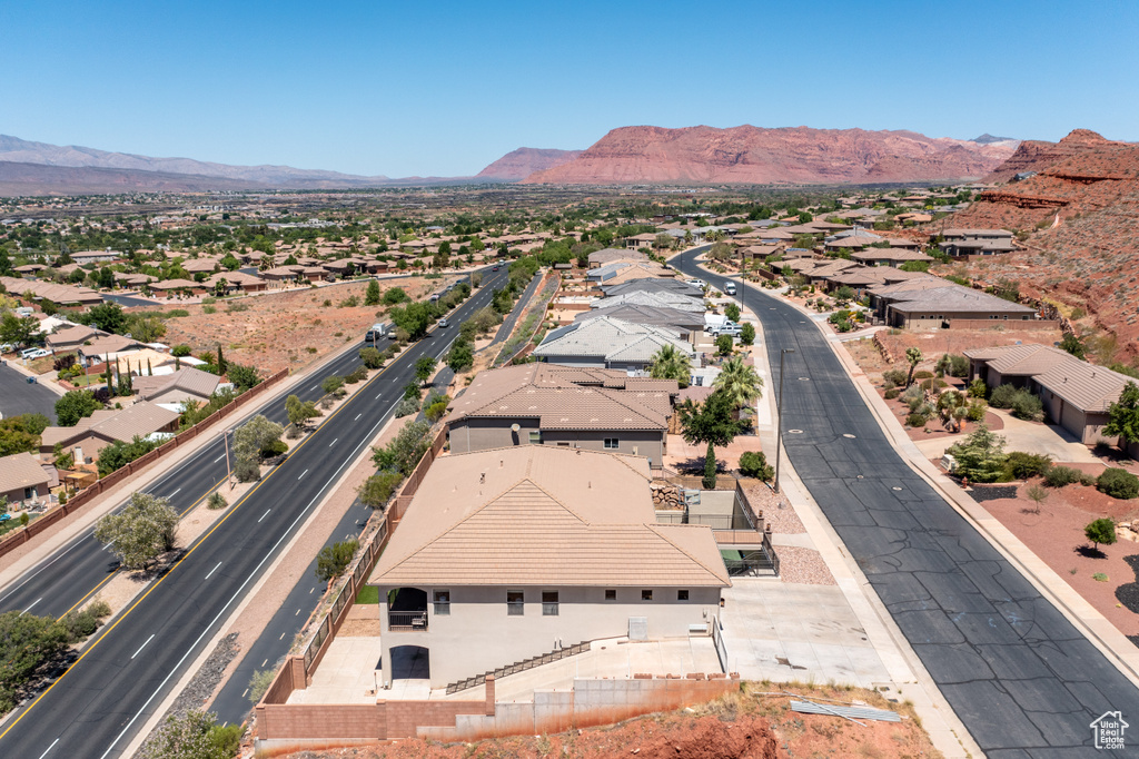 Birds eye view of property featuring a mountain view