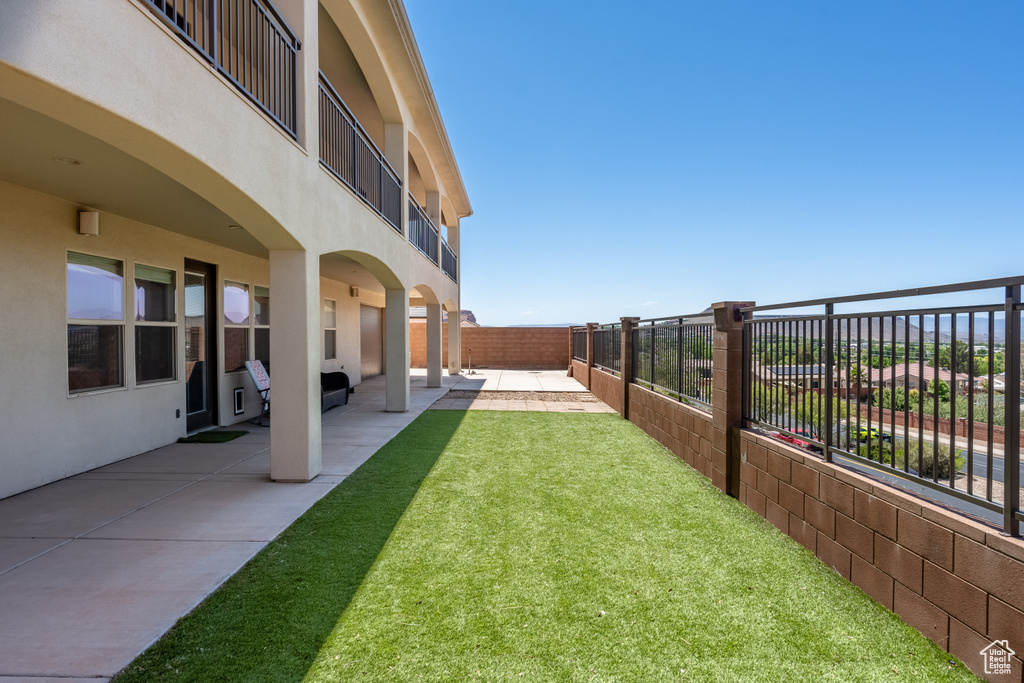 View of yard with a patio area